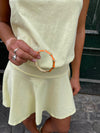 Sola armbånd med striber - Orange/guld