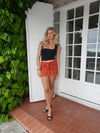 Stassy mini nederdel med bindedetalje - Orange