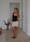 Stassy mininederdel med bindedetalje - Beige